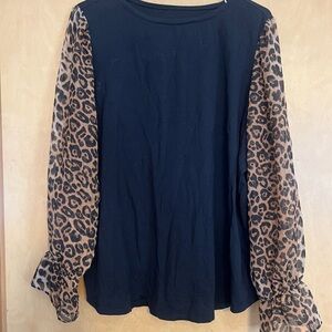 Elegant Black Blouse with Leopard Print Sleeves